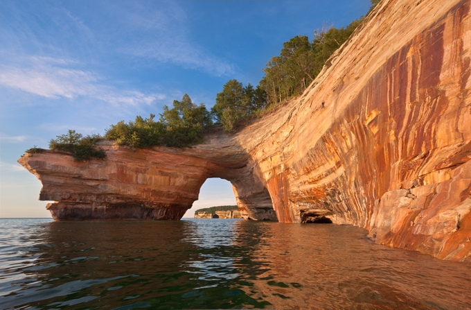 Image of "Lovers Leap," an imposing arch of rock extending from the shoreline of Lake Superior. Photo provided courtesy of http://www.picturedrocks.com/.